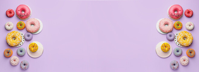 Many sweet donuts on lilac background with space for text