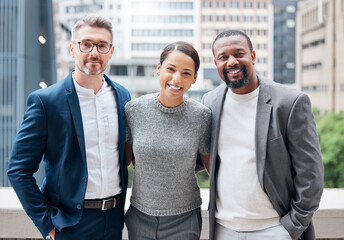 Learned the value of working hard, by working hard. Portrait of a group of businesspeople enjoying a break outside at the office.