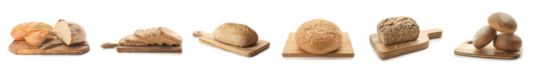 Cutting boards with fresh tasty bread on white background