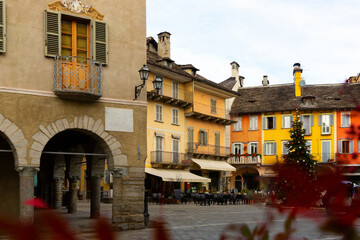 View of empty Piazza del Mercato in historical center of small Italian town of Domodossola with...