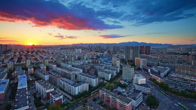 Rotating time lapse of a bustling and beautiful city in China, from sunset to night