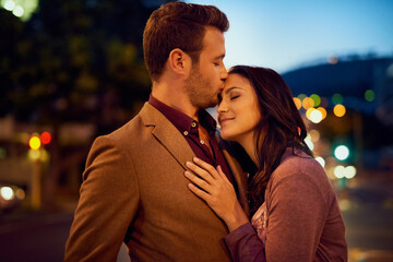 If my love could grow wings, Id be soaring. Cropped shot of an affectionate young couple enjoying a night out.