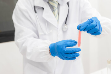 Medical Science Laboratory: Portrait of a beautiful scientist looking under a microscope analyzing a test sample. Ambitious young biotechnology specialist work with advanced equipment