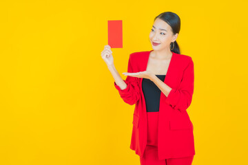 Portrait beautiful young asian woman with red envelope