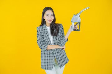 Portrait beautiful young asian woman feul gas pump