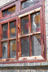 Close-up of traditional glass and wooden windows in ancient Chinese building