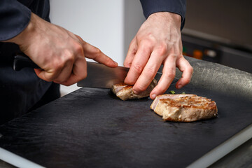 Chef cutting meat