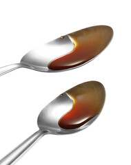 Chinese oyster sauce in spoon on white background