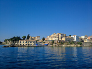 Corfu, Greece - July 7, 2018: Beautiful view from the ship to the old town of Corfu against the blue sky. Copy space