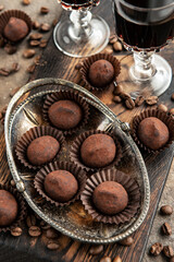 Obraz na płótnie Canvas Tasty chocolate candy, chocolate liqueur and coffee beans