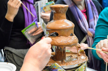  colorful fondue chocolate fountains at the event