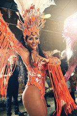 The thrill of performing live. Cropped portrait of a beautiful samba dancer performing at Carnival...