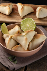 Portion of sfiha on a plate.