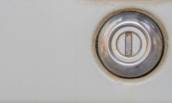 Keyhole on white truck door