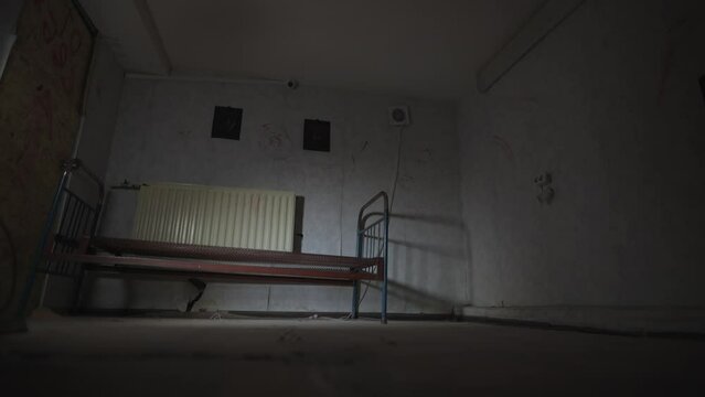 Abandoned room where paranormal activity occurs. Poltergeist moves furniture.