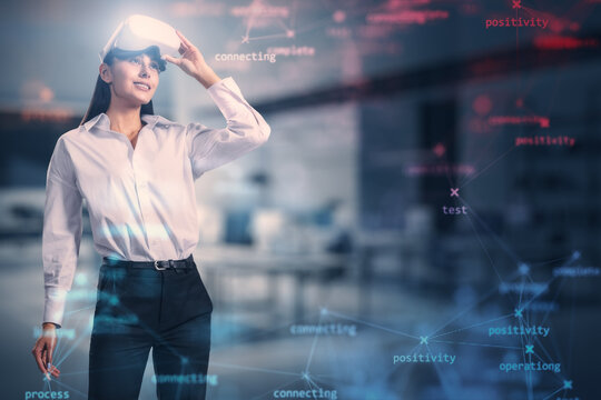 Attractive young european businesswoman with VR glasses and creative process stages mesh on blurry office interior background with mock up place.