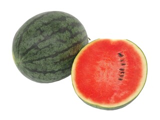 Whole and half watermelon on white background. closeup photo, blurred.