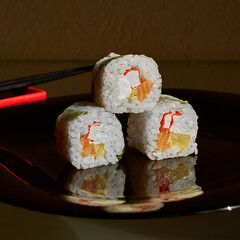 Bright sushi on a dark background	