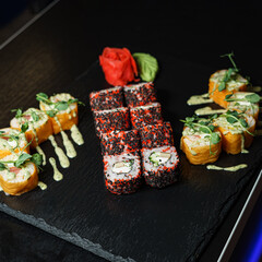 Bright sushi on a dark background	