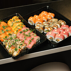 Bright sushi on a dark background	