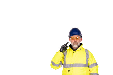 A construction worker in a bright yellow hi-viz coat and safety gloves wearing tinted safety glasses for eye protection isolated on white background. Safety on construction site banner concept