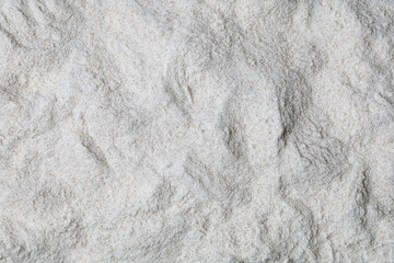 Whole grain flour. Scattered flour. Flour texture.