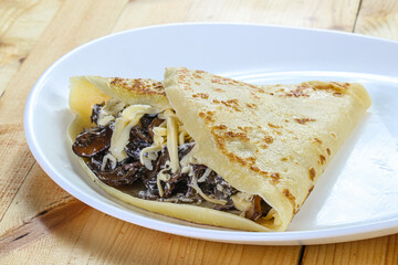 Pancake with mushroom and cheese