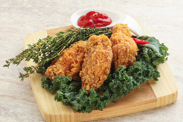 Crispy chicken wings with tomato ketchup