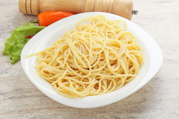 Italian pasta boiled spaghetti with oil