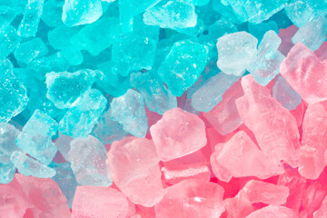 Salt crystals, sea salt as background and texture. Ice crystals Blue and pink