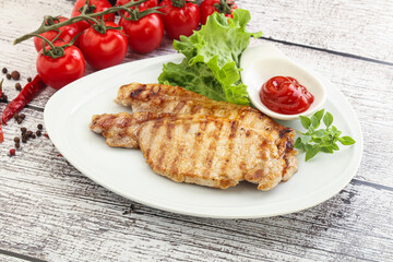 Grilled pork steak with ketchup