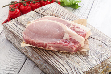 Raw pork t-bone steak for grill