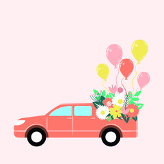 pickup truck full of flowers and balloons. a pickup truck with a bouquet of flowers going to the holiday. © Marina