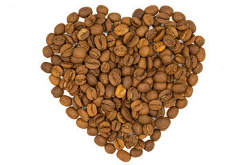 Coffee beans isolated on a white background. Heart shape with coffee beans. Close-up. Top view