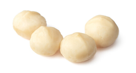 Shelled Macadamia nuts isolated on white background.