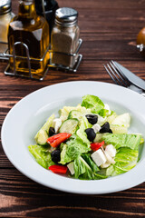 fresh salad with cheese and olives