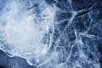 beautiful blue ice with cracks. frosty texture
