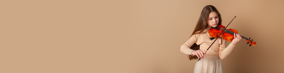 Banner with a girl playing the violin on a beige background © Kiryakova Anna