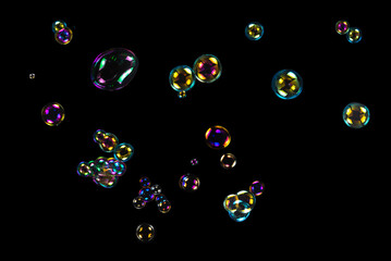 Soap bubbles isolated on a black background
