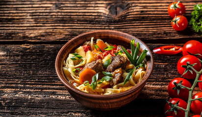 Top view of lagman or laghman Uzbek and Central Asia cuisine concept. Assorted Uzbek food