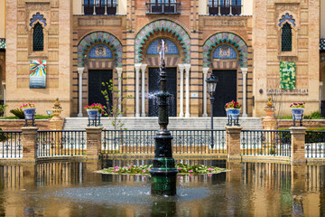 A fountain and moorish building in Sevilla