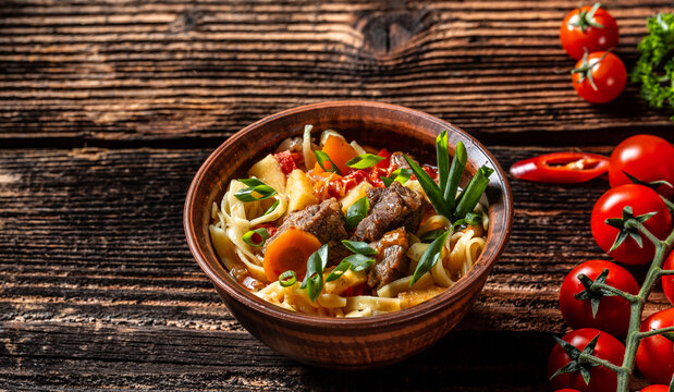 Top view of lagman or laghman Uzbek and Central Asia cuisine concept. Assorted Uzbek food