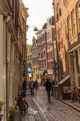 Amsterdam, Netherlands, April 2022. The narrow streets in the redlight district in Amsterdam.