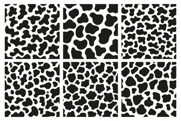 Black polka dot background of milk cow leather.