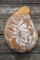 homemade sourdough beetroot bread on a wooden saw cut