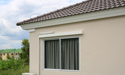Glass Window on the outside of a new house.