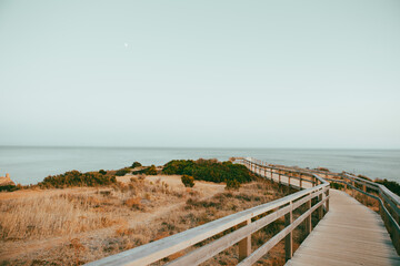 Coastal walkway along cliffs in summer, Algarve, Portugal