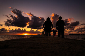 silhouette of a couple on the beach, sunset, Sicilia