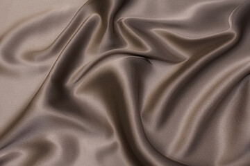 Close-up texture of natural beige fabric or cloth in brown color. Fabric texture of natural cotton...