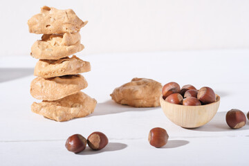stack of Ugly but good,famous Italian Piedmont cookies. Italian cuisine, cooking, traditional baking with egg and nuts. brutti ma buoni